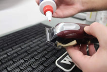 Load image into Gallery viewer, Wahl Clipper Oil 4 floz Model No. 3310 Blade Oil for Hair Clippers, Beard Trimmers and Shavers, Lubricating Oils for Clippers, Maintenance for Blades, Suitable for Hair Clipper and Trimmer Blades, Reduces Friction - Zeepkbeautysupply